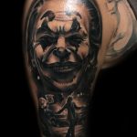 bohóc joker kar tetoválás, clown joker tattoo arm